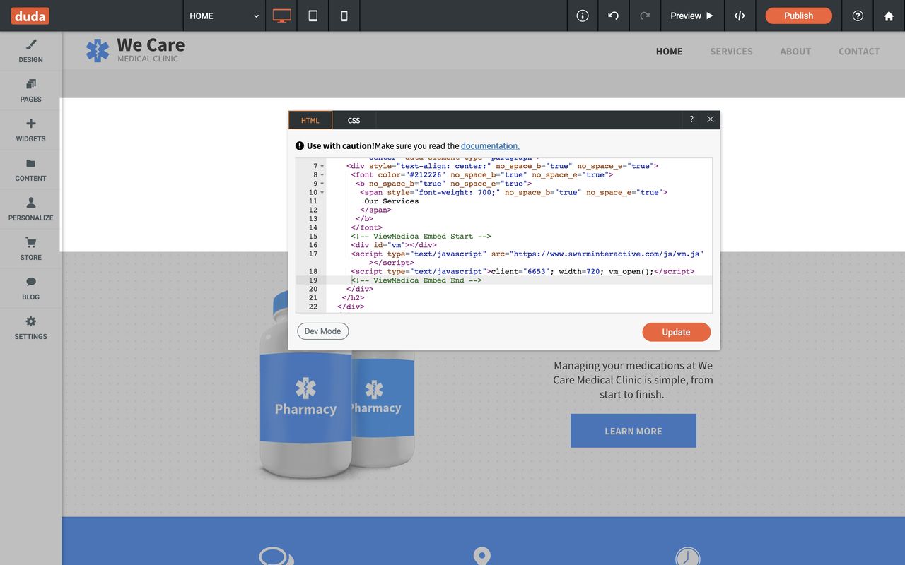 The HTML widget modal is open and the ViewMedica embed code has been pasted into the editor.
