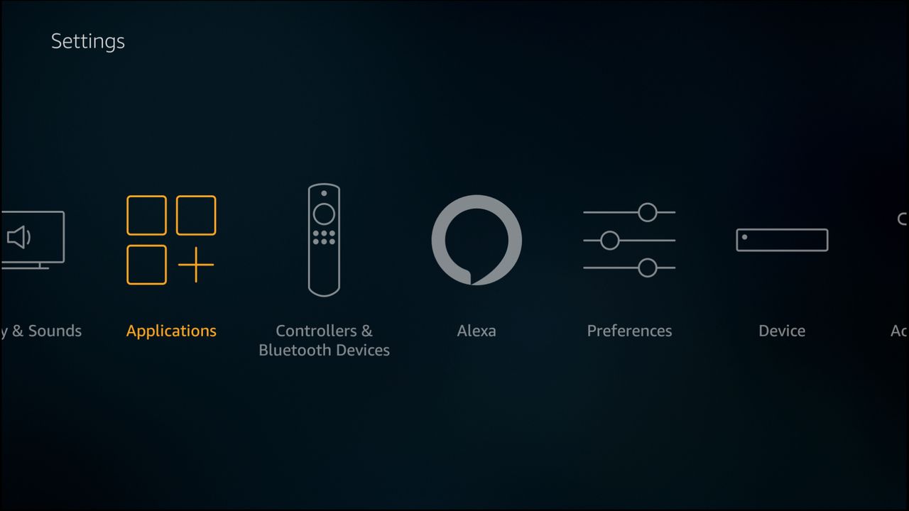 The applications option is selected in the Fire TV settings panel.